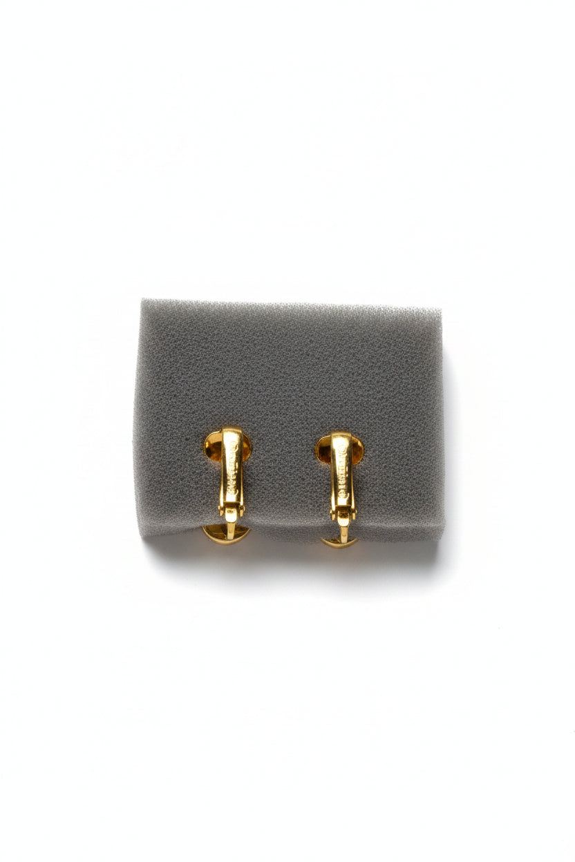 Boucles d'oreilles Dior logo en métal doré