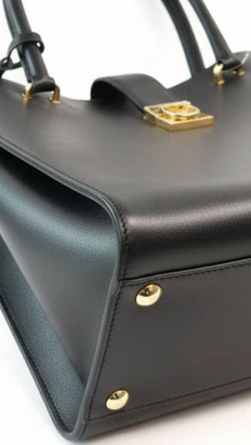 Black leather Ferragamo handbag