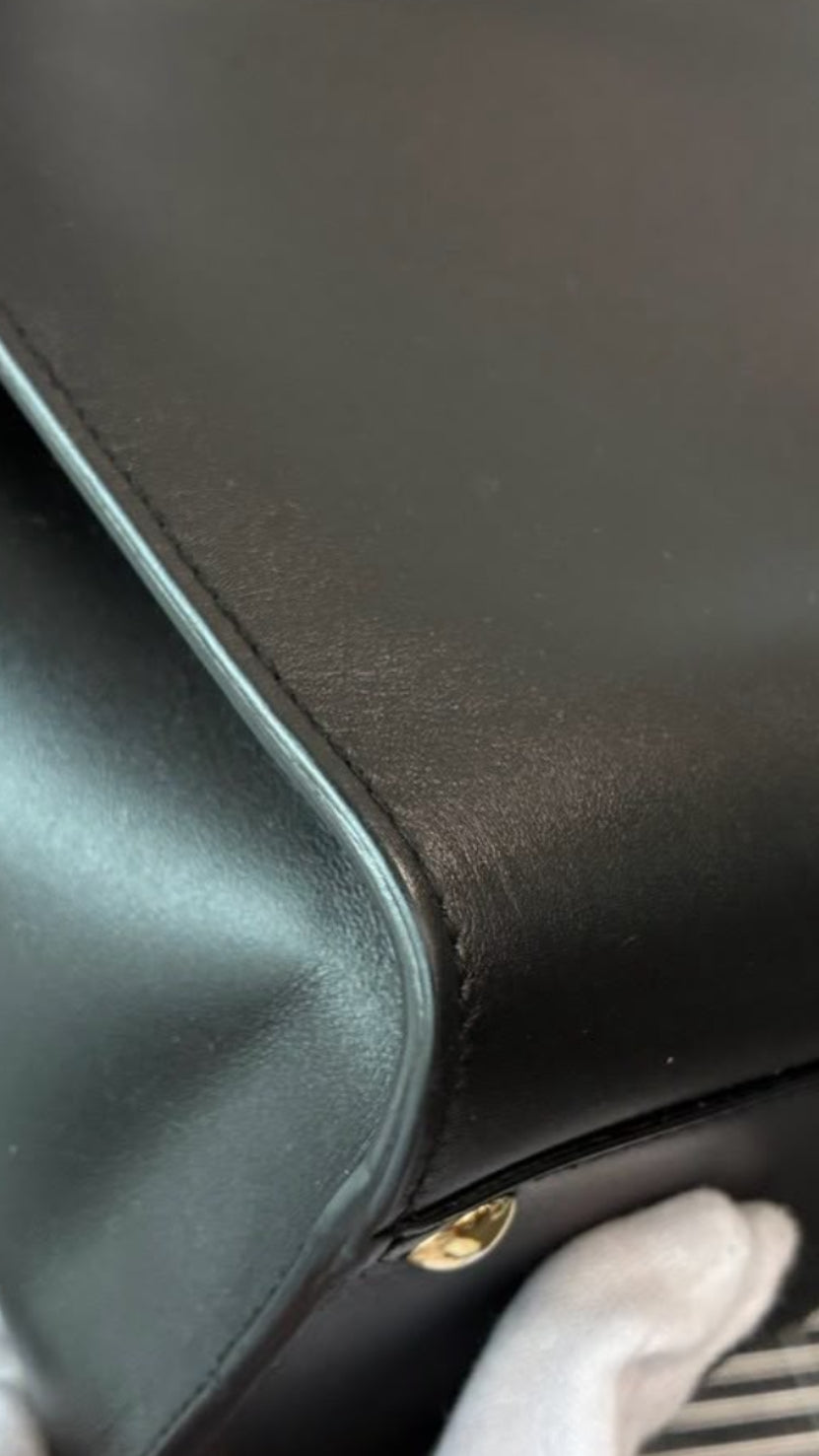 Sac à main Ferragamo en cuir noir
